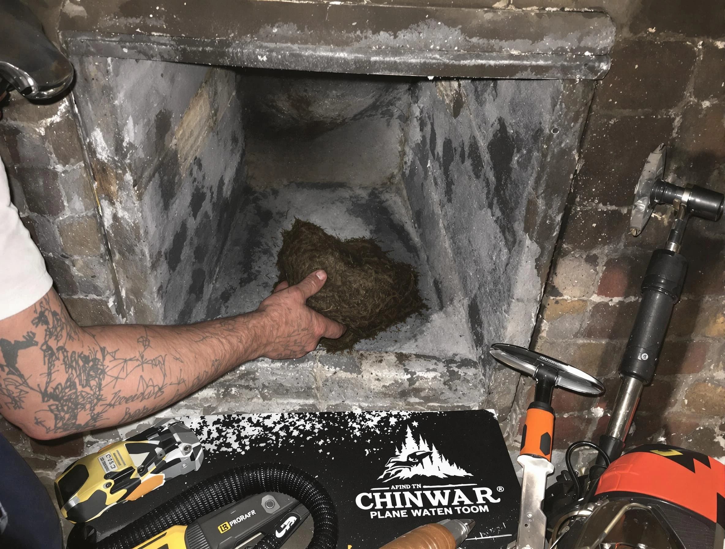 Austell Chimney Sweep safely removing debris and screening chimney in Austell, GA