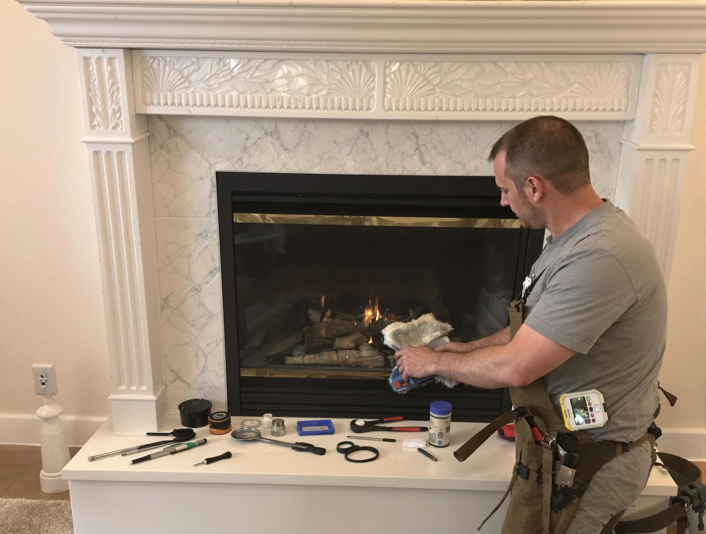 Austell Chimney Sweep performing fireplace maintenance in Austell, GA